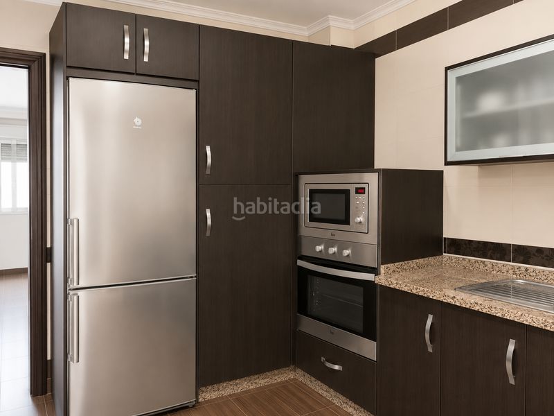 Foto cba3c25e-90bb-46ea-bb3f-500739684704. Casa adossada a Lora del Río