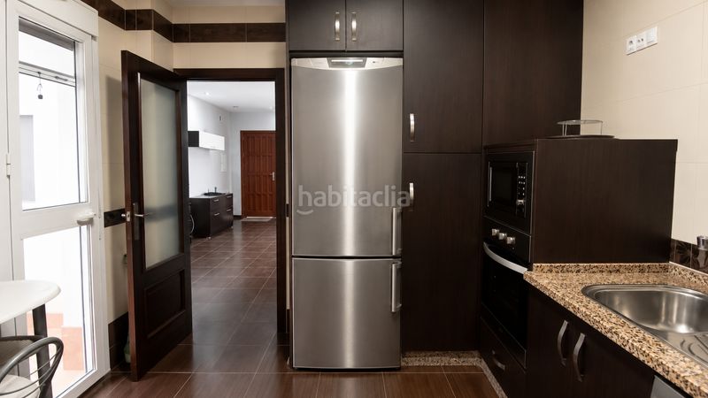 Foto d85d46dc-644d-4632-813d-878089880624. Casa adossada a Lora del Río