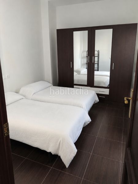 Foto db8ae7d9-464d-431b-a043-2f713d0fce78. Casa adossada a Lora del Río