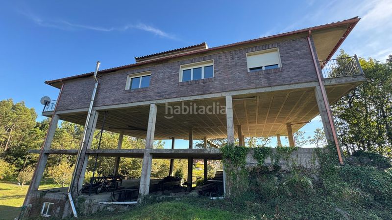 Foto 90cd5933-efbe-4768-b9ae-2f546d2c18f2. Casa amb calefacció aparcament a Aldán Cangas