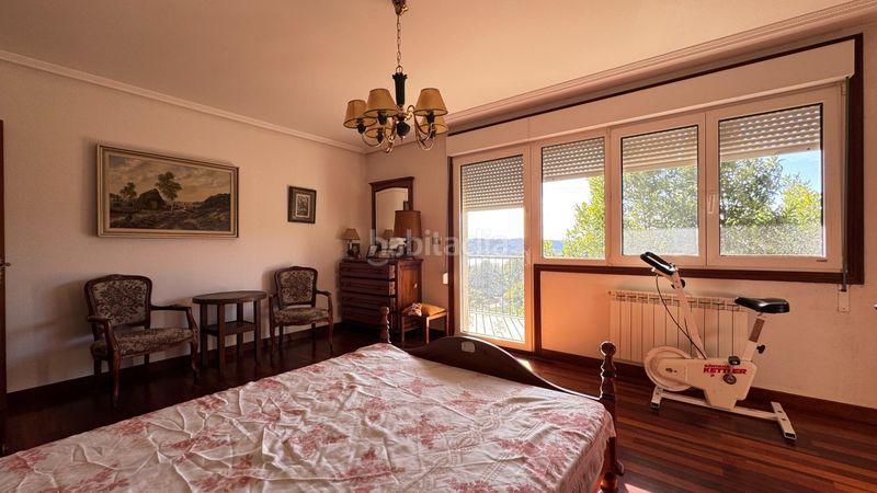 Foto 9a07bb35-a0af-466f-8ce9-59dc0720637a. Casa amb calefacció aparcament a Aldán Cangas
