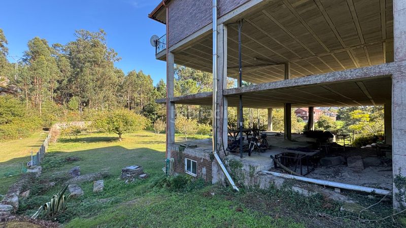 Foto efdb4a7e-ae87-4b4f-a3d2-d872fbb38078. Casa amb calefacció aparcament a Aldán Cangas