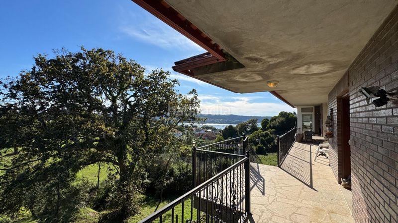 Foto f8326d50-8674-4643-9c32-a72a88c4a8ff. Casa amb calefacció aparcament a Aldán Cangas