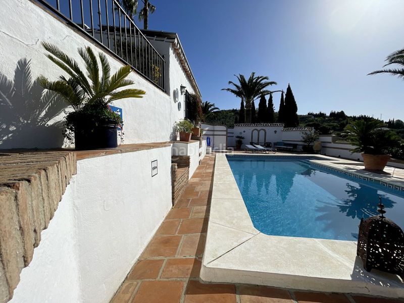 Foto c40e0ab4-d6bb-4897-a6c4-6ab090b742f5. Masia amb xemeneia calefacció aparcament piscina a Villanueva De La Concepción