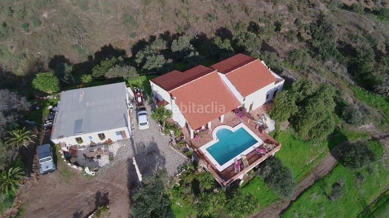 Foto df26bad1-c5a6-4bf6-9892-b842442aba3b. Masia amb xemeneia calefacció aparcament piscina a Álora