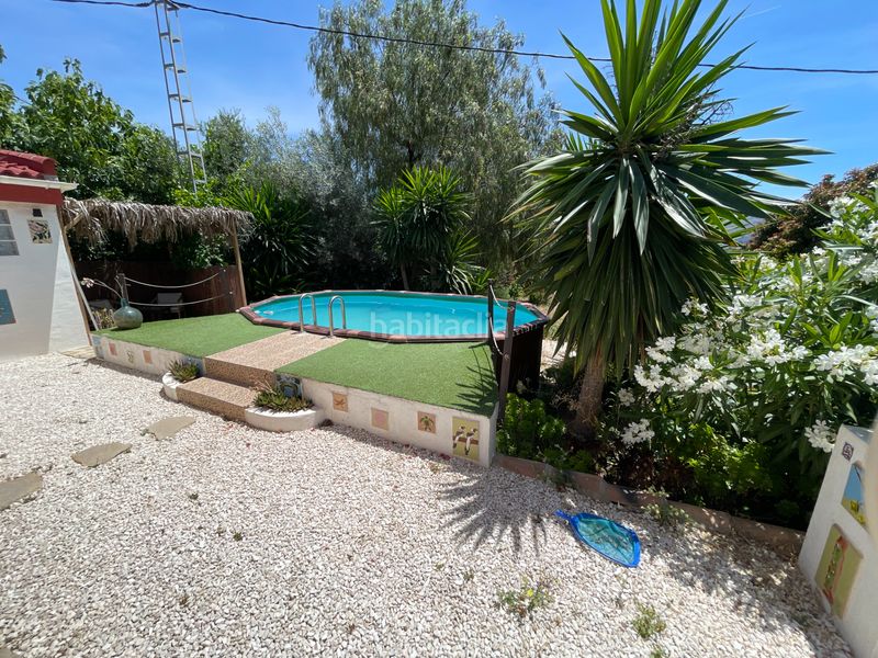 Foto 3aa3a758-a5a2-45d7-8817-33ec89e4b86b. Masia amb xemeneia calefacció aparcament piscina a Álora