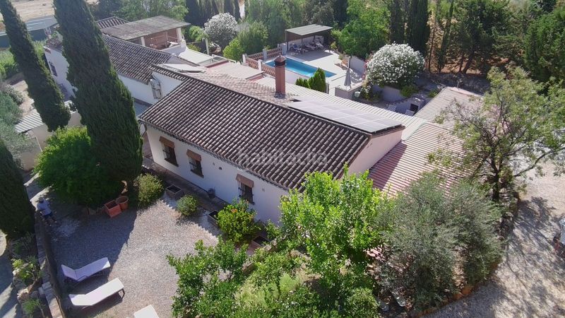 Foto 02eb1629-8e20-48b9-ba6a-be12677e5e46. Casa amb xemeneia calefacció aparcament piscina a Álora