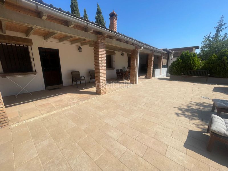 Foto 4063b301-34d0-408f-a9c5-1938a68a78f5. Casa amb xemeneia calefacció aparcament piscina a Álora