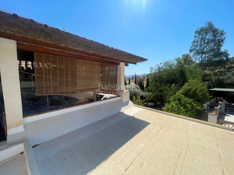 Foto 416477ed-4660-4d9b-b723-44f79cfdc033. Casa amb xemeneia calefacció aparcament piscina a Álora
