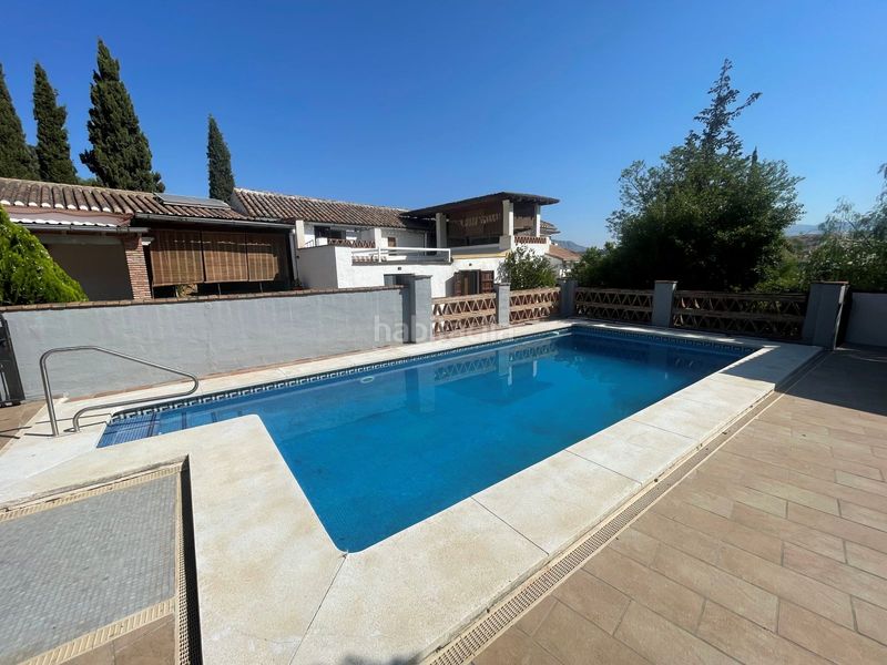 Foto 974f4bc5-d386-493e-834a-7354a82ceffc. Casa amb xemeneia calefacció aparcament piscina a Álora