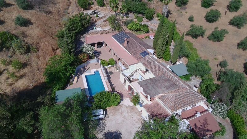 Foto b6af6d9f-e075-4b40-8e88-f4f7697de451. Casa amb xemeneia calefacció aparcament piscina a Álora