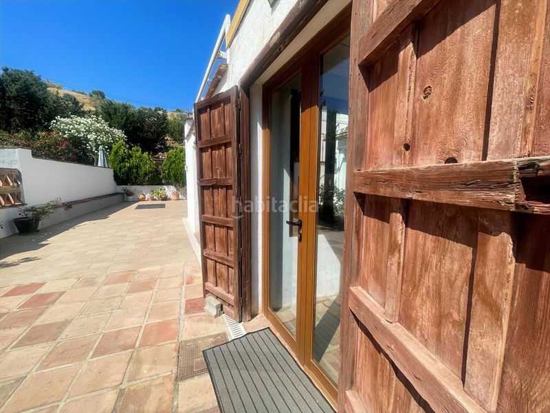 Foto cd16bd41-83cf-4091-9315-8df3ca931616. Casa amb xemeneia calefacció aparcament piscina a Álora