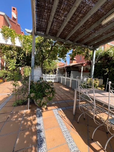 Foto 1313f2c8-21cc-4a28-a4a9-6883bd4a6d5e. Casa amb calefacció piscina a Las Conejeras-Eparragal Coslada