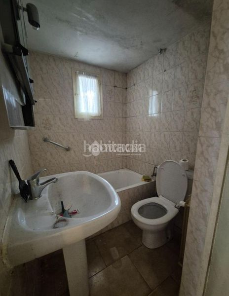 Foto b5a00c54-6c4b-4779-b7e0-ac7447f825dc. Casa aparellada a Sigüenza