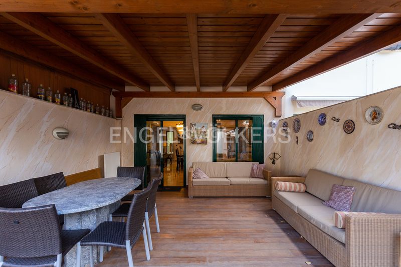 Foto c5765f31-cf33-4e03-8cc6-76e41bf9ac44. Casa adossada amb calefacció aparcament a Malva Rosa Valencia