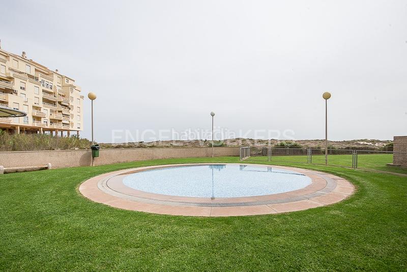 Foto 66bb0e92-03df-4e76-b1fe-c2b3719ecbe5. Appartement mit heizung parking pool in El Perellonet Valencia