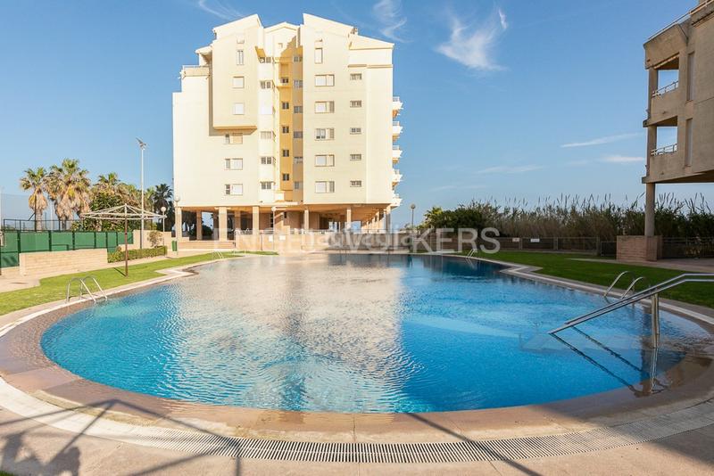 Foto b96db2be-51ea-48db-a178-6d77b6df9984. Appartement mit heizung parking pool in El Perellonet Valencia