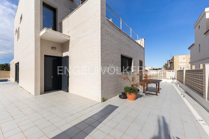 Foto 315a0476-8c6d-4900-bf31-9fcfe6c102c2. Casa amb calefacció aparcament piscina a El Dossel - Mareny de San Lorenzo Cullera