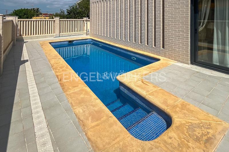 Foto 8ed9285e-58de-4747-b01c-e34a35906e2a. Casa amb calefacció aparcament piscina a El Dossel - Mareny de San Lorenzo Cullera