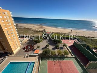 Rent Apartment in Playa del Puig. Piso en primera línea de mar con terraza para meses de verano