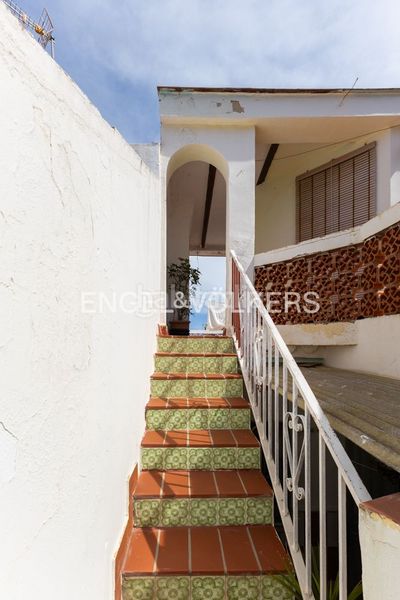 Foto 1de0f962-ca51-4e7b-9e08-79b817332edc. Casa adossada amb calefacció a El Puerto Dénia