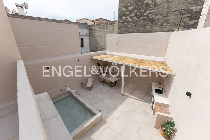 Foto 5c38eade-3c20-4cc0-bb7c-8adc11059ec0. Casa adossada amb calefacció piscina a Casco Urbano Náquera