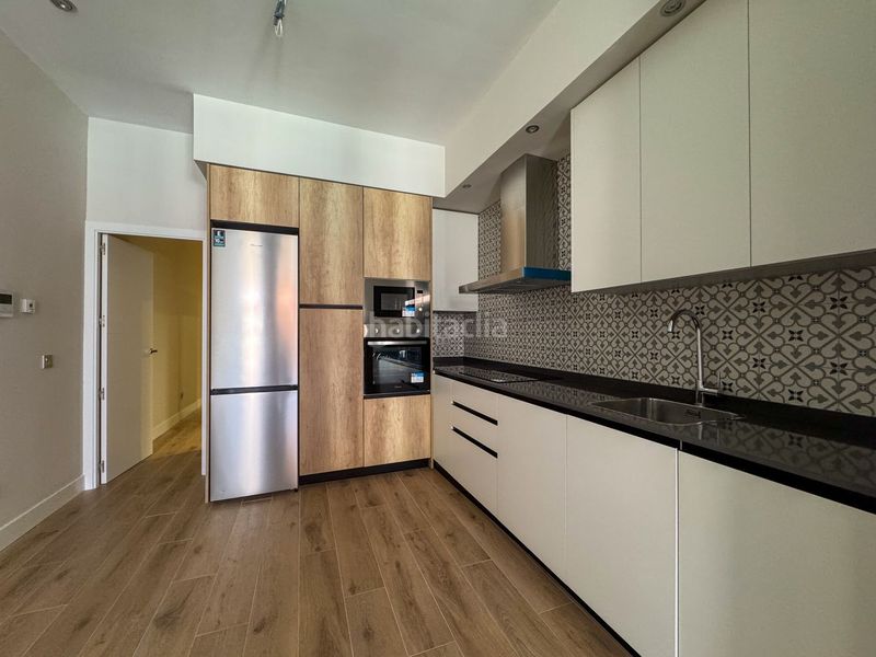 Foto c439d81c-ce2b-46a8-b0ac-6c1449f3a286. Flat with heating in San Juan Bautista Madrid