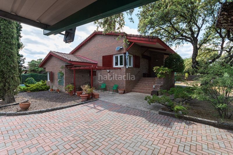 Foto a61b493a-f919-4747-861c-473a06c09ab3. Casa amb calefacció a Navalquejigo-Los Arroyos Escorial (El)