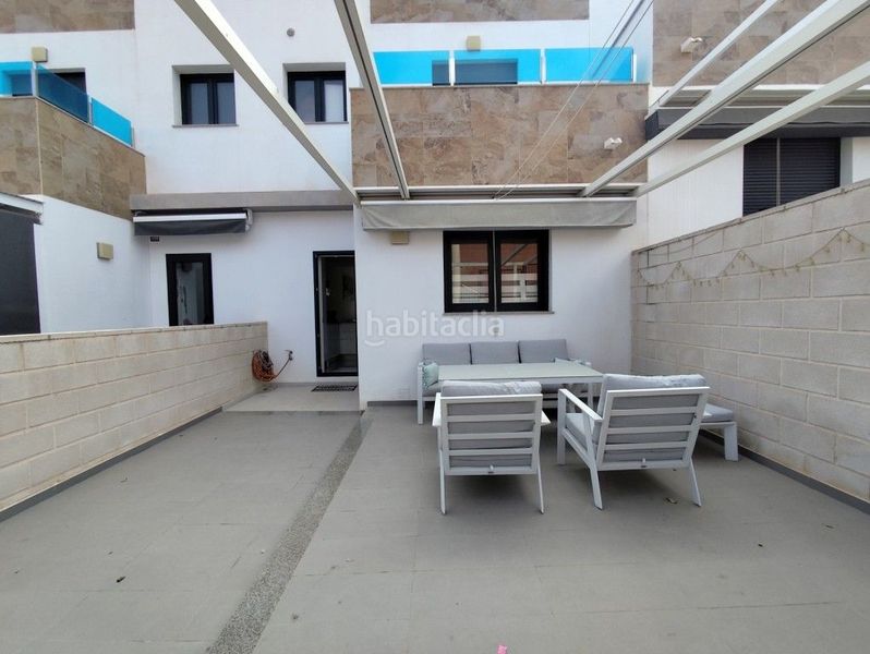 Foto 598e37cc-0fa0-436d-8701-3f47a83d1174. Casa adossada amb piscina a Bigastro