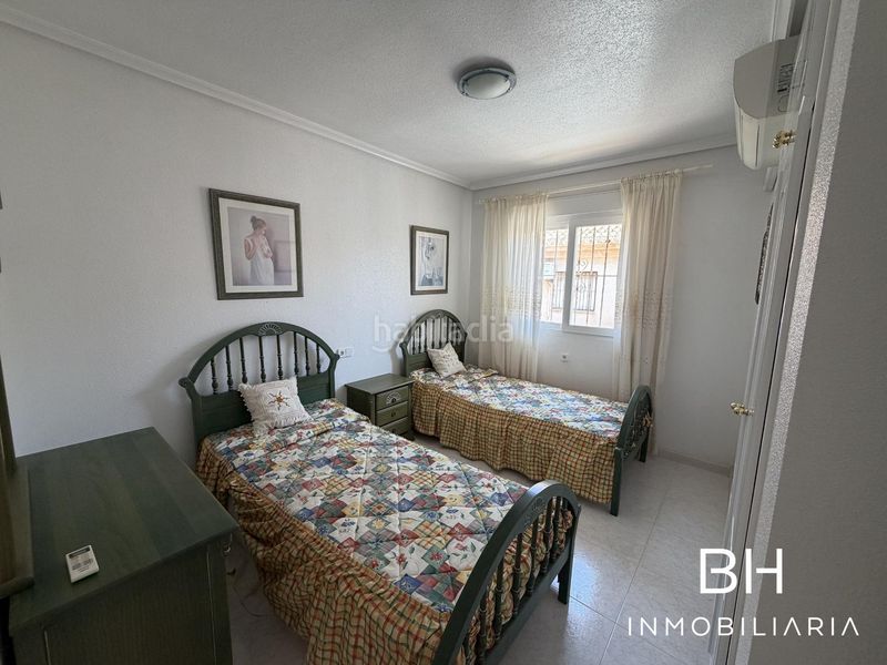 Foto 7a1b7271-2a4d-44a9-9f0b-7f12a1ced8a5. Casa a Playa Flamenca Orihuela