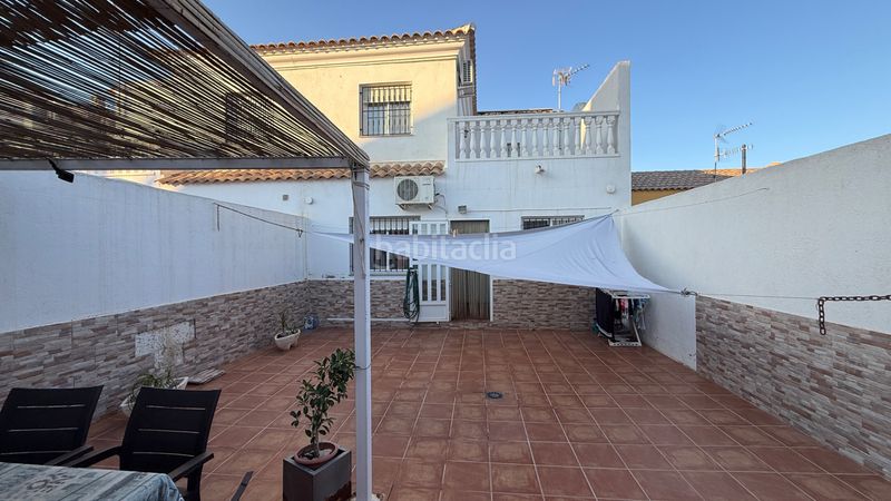 Foto 1cb1dd2c-8988-4b11-bcf0-a37447d72fa8. Casa adossada amb xemeneia calefacció aparcament a Lorca