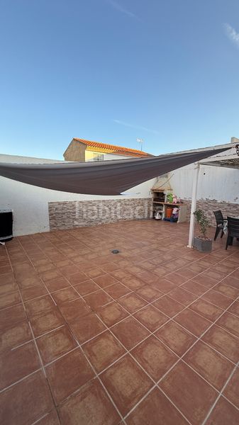 Foto bdb1e5b1-5e50-4505-9313-a5b9fe7c61a4. Casa adossada amb xemeneia calefacció aparcament a Lorca