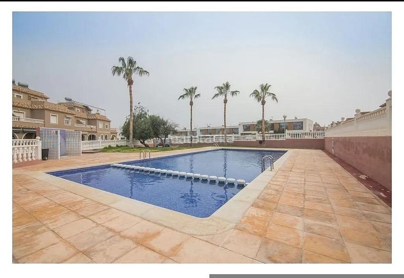Foto 71413029-6e4a-49fe-8658-b27d7502a6a9. Casa amb aparcament piscina a Monte y Mar Santa Pola