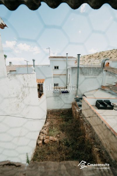 Foto d00ba548-a610-42a9-b601-fa2d259bc139. Casa con camino in Vilafamés
