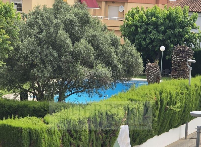 Foto 28a5ab46-f286-4d52-ba69-3c23282466b2. Casa aparellada amb calefacció aparcament piscina a Gandia
