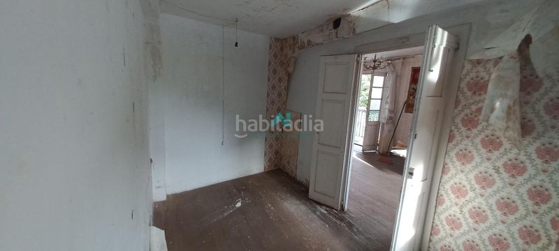 Foto c05afb4e-f7ec-4de2-a405-ea38e5c67dbc. Masia a Limpias
