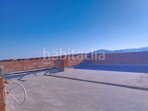 Foto a97b0deb-3e5f-495b-9167-f6b29dbc9ec2. Casa adossada a Periana