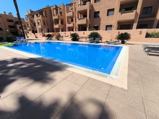 Piano terra in Las Lomas de Rame-Bahía Bella. Este apartamento en planta baja de 2 dormitorios y 2 baãos, comp