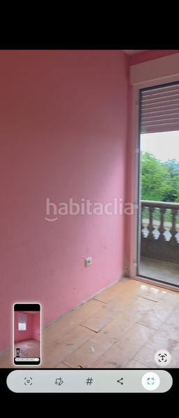 Foto a861c763-d475-4007-b886-50c4d306f90a. Casa amb aparcament a Lavadores Vigo