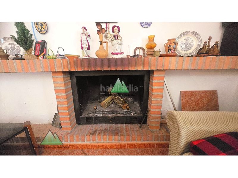 Foto f2160949-e4f5-4d21-af96-bf498913d9a0. Casa adossada a Alfarnate