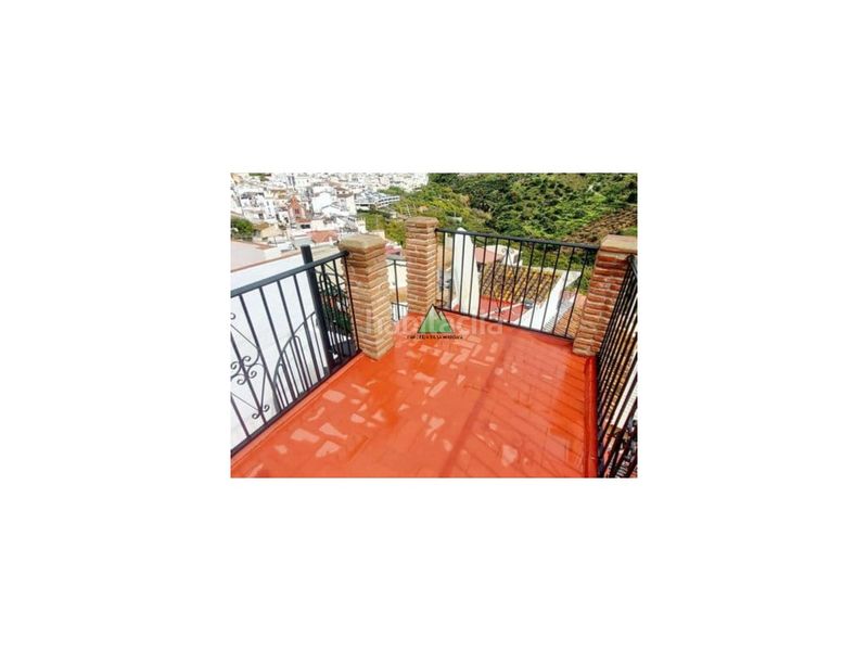 Foto d476275f-68ad-4b15-92b8-8eef2f4e44c4. Maison dans Urbanización Santa Rosa Torrox