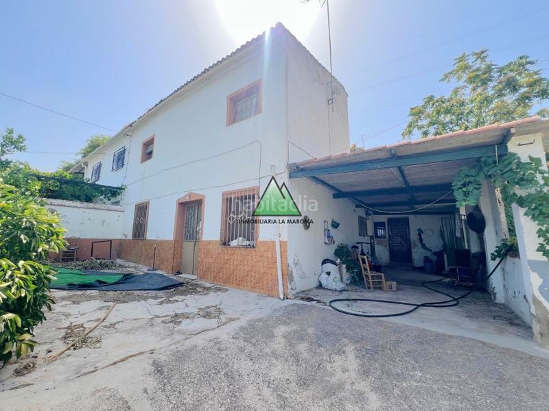 Foto 58cf5b46-1d59-4f7c-a2c2-c67cc6fc8d90. Casa amb aparcament a Loja