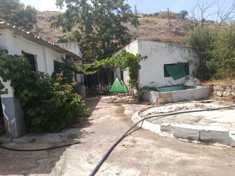 Foto 67f67597-1027-4a32-8579-ba0de21dd7a0. Casa amb aparcament a Loja