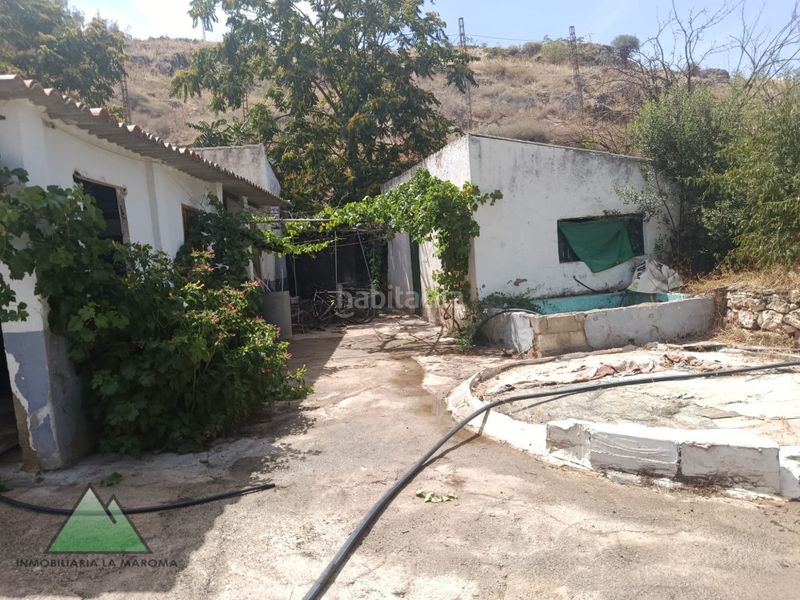 Foto f50bc142-a23f-4587-ad07-7a7d492e6cd1. Casa amb aparcament a Loja