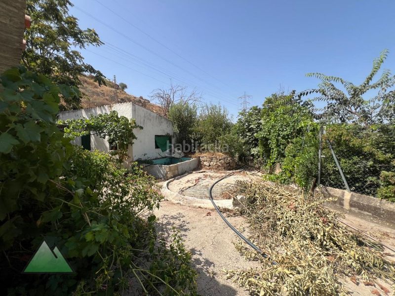 Foto fe2285bb-9497-40d5-a310-4a3b59ef0431. Casa amb aparcament a Loja