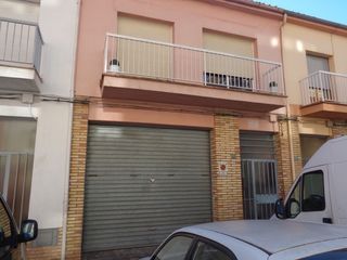 Casa adossada a Carrer de torras i bages 77