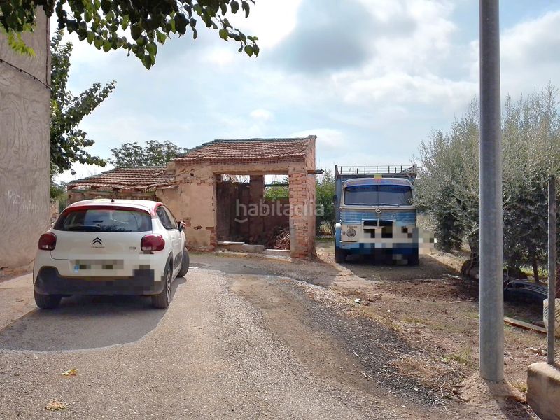 Foto 7f8c94c5-4672-4d67-88f8-eae8ab6cf7f5. Masia amb xemeneia aparcament a Rincón de Seca Murcia