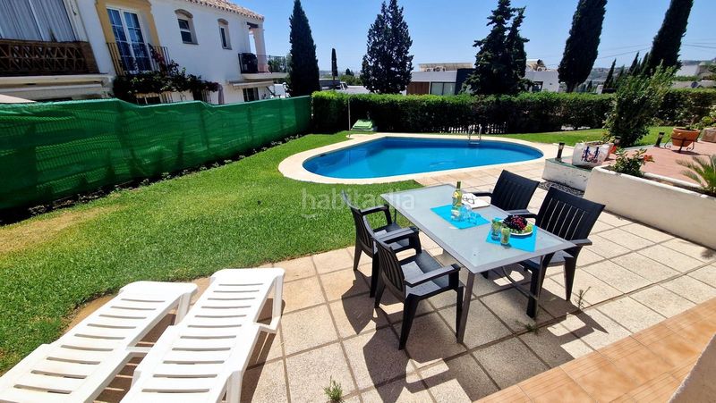Foto 4e772dce-372b-4e61-bcef-d4474d0fc8fd. Casa a schiera con camino piscina in Mijas golf Mijas