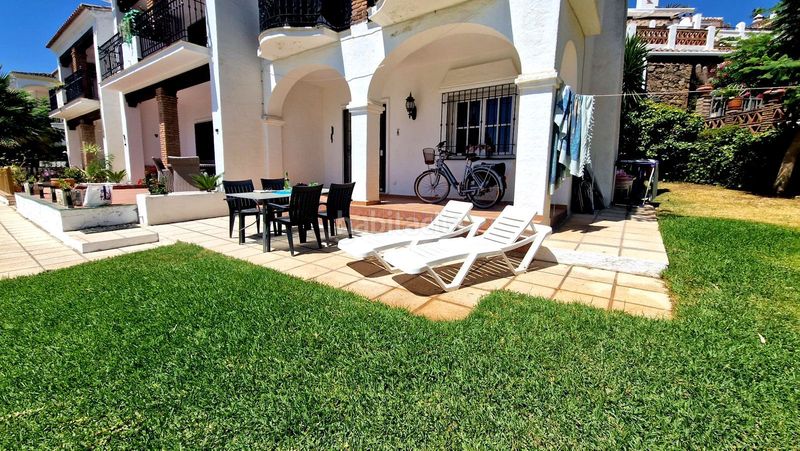 Foto 4f289d97-2d8b-443d-a867-72fe37180e8b. Casa a schiera con camino piscina in Mijas golf Mijas