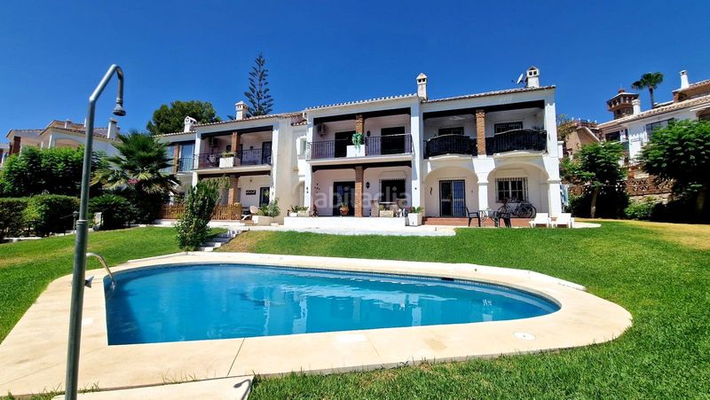 Foto 62211195-3145-4072-ab85-6fee356ec957. Casa a schiera con camino piscina in Mijas golf Mijas